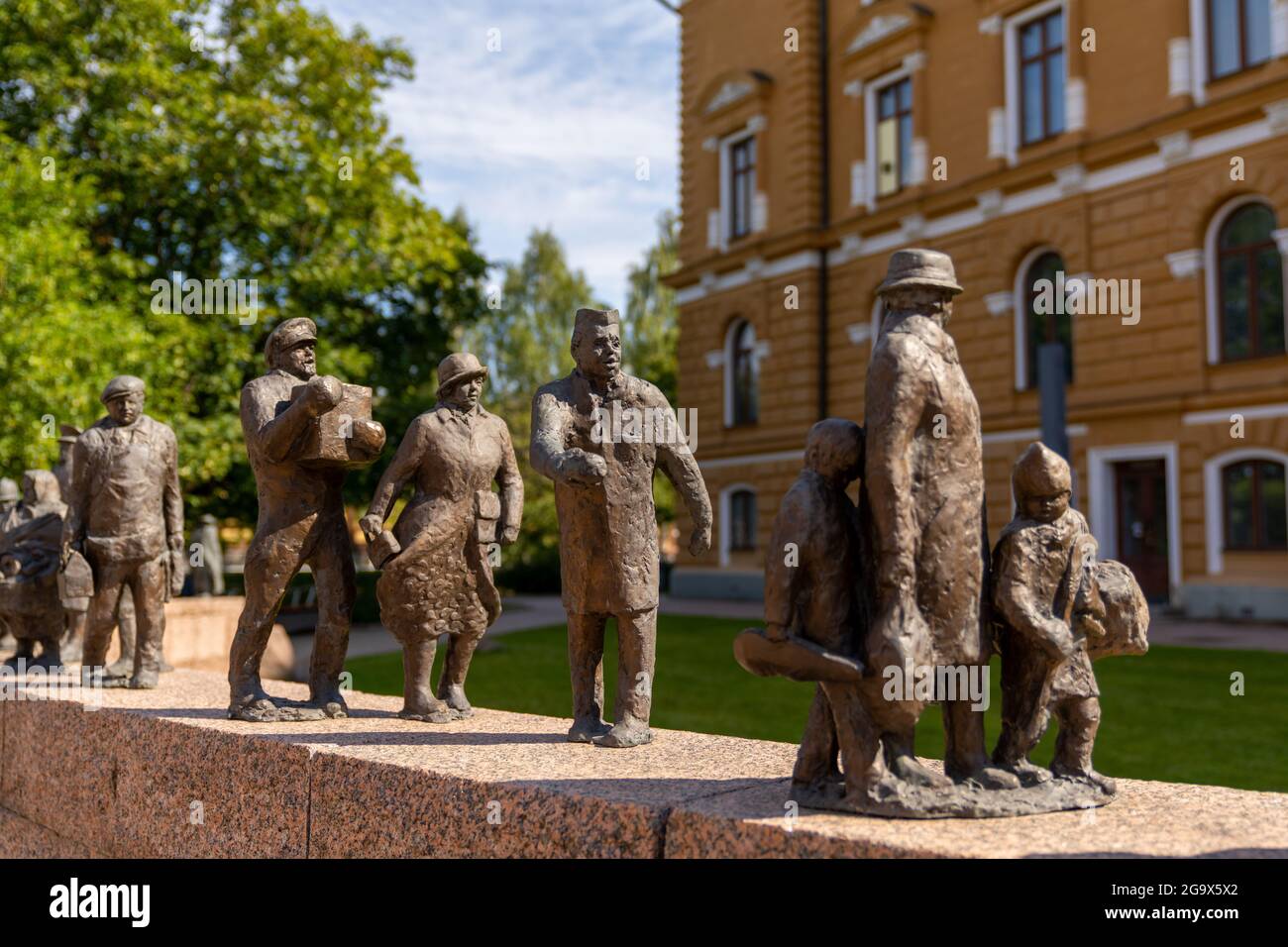 Oulu, Finland - 25 July, 2021: view of the Ajan Kulku bronze statues commemorating the city history of Oulu in the park in front of the city hall Stock Photo