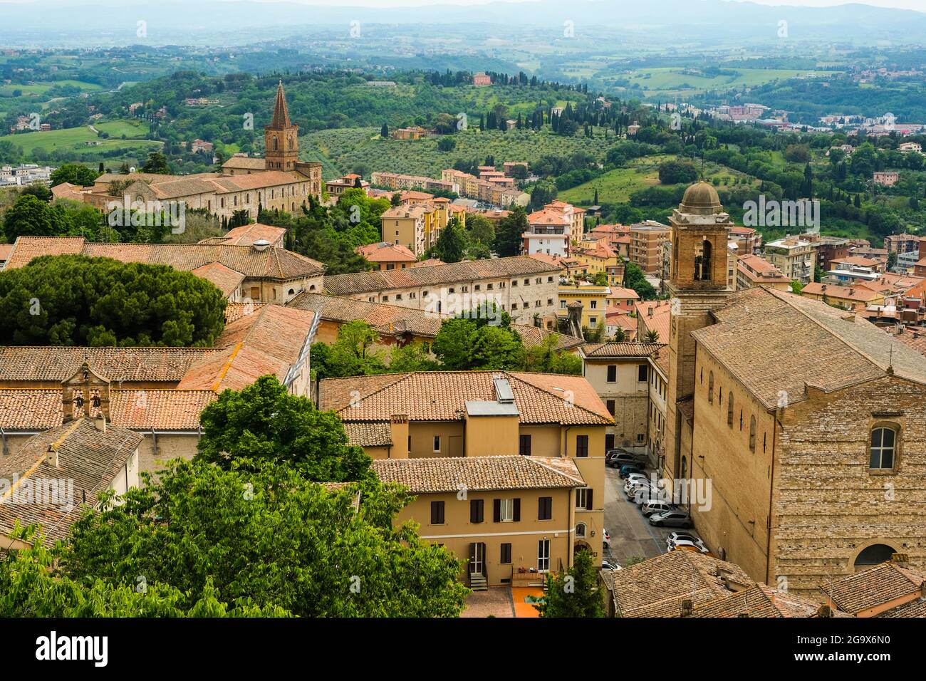 Rooftops and rolling Umbrian hills in Perugia Italy Stock Photo