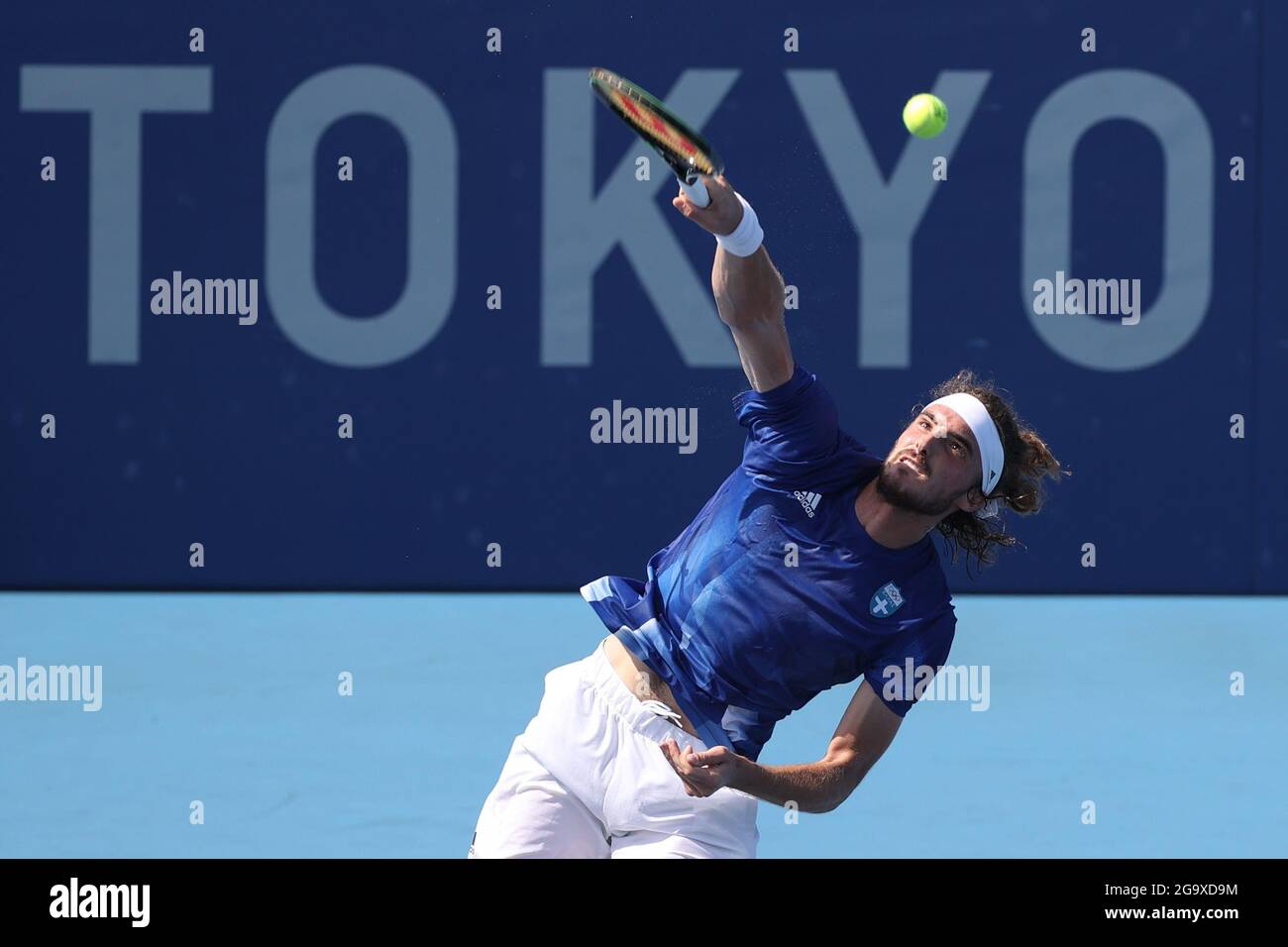 Tokyo, Japan. 28th July, 2021. Stefanos Tsitsipas of Greece serves during tennis Men's Singles Third Round match against Ugo Humbert of France at the Tokyo 2020 Olympic Games in Tokyo, Japan, on July 28, 2021. Credit: Zheng Huansong/Xinhua/Alamy Live News Stock Photo