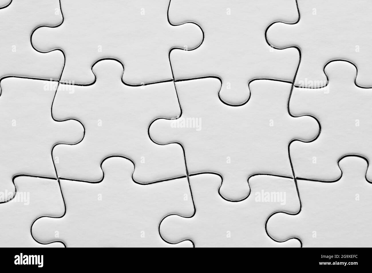 Blank or empty white jigsaw puzzle background. Close up macro view
