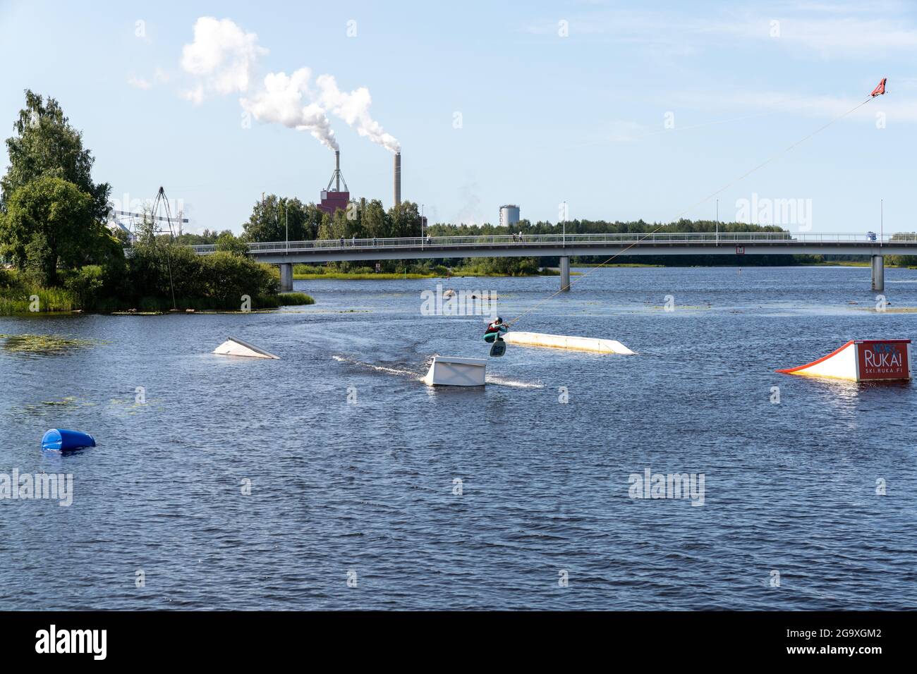 Oulu, Finland - 25 July, 2021: wakeboarder having fun in the wakepark in downtown Oulu on a beautiful summer day Stock Photo