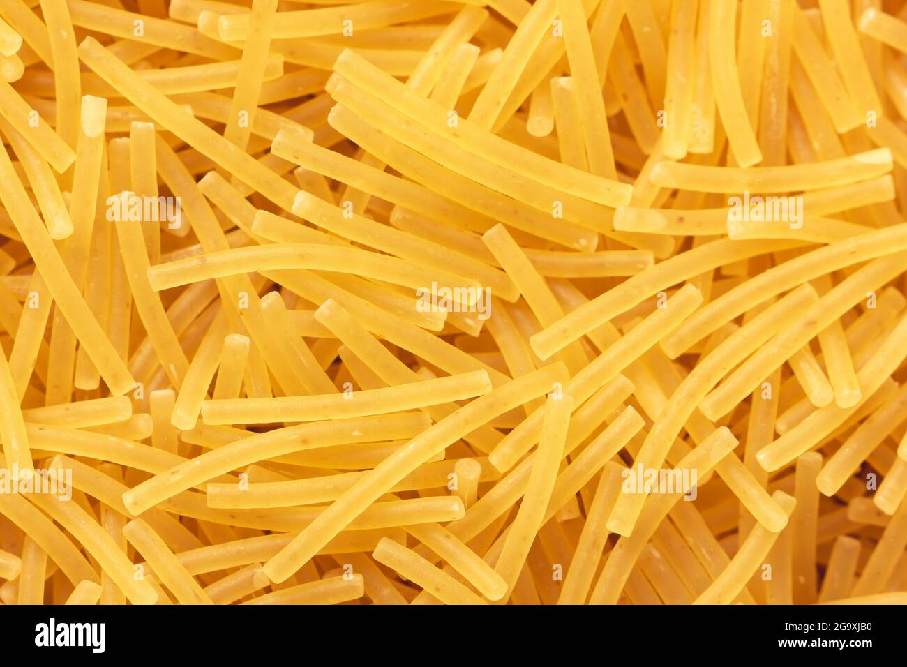 Dry vermicelli pasta backround Stock Photo Alamy