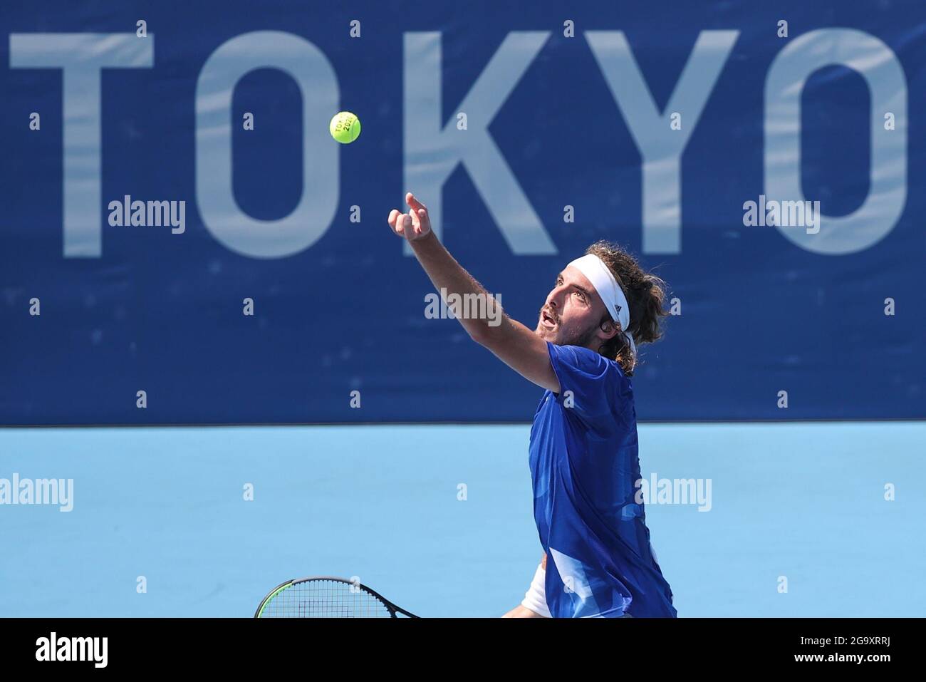 Tokyo, Japan. 28th July, 2021. Stefanos Tsitsipas of Greece serves during tennis Men's Singles Third Round match against Ugo Humbert of France at the Tokyo 2020 Olympic Games in Tokyo, Japan, on July 28, 2021. Credit: Zheng Huansong/Xinhua/Alamy Live News Stock Photo