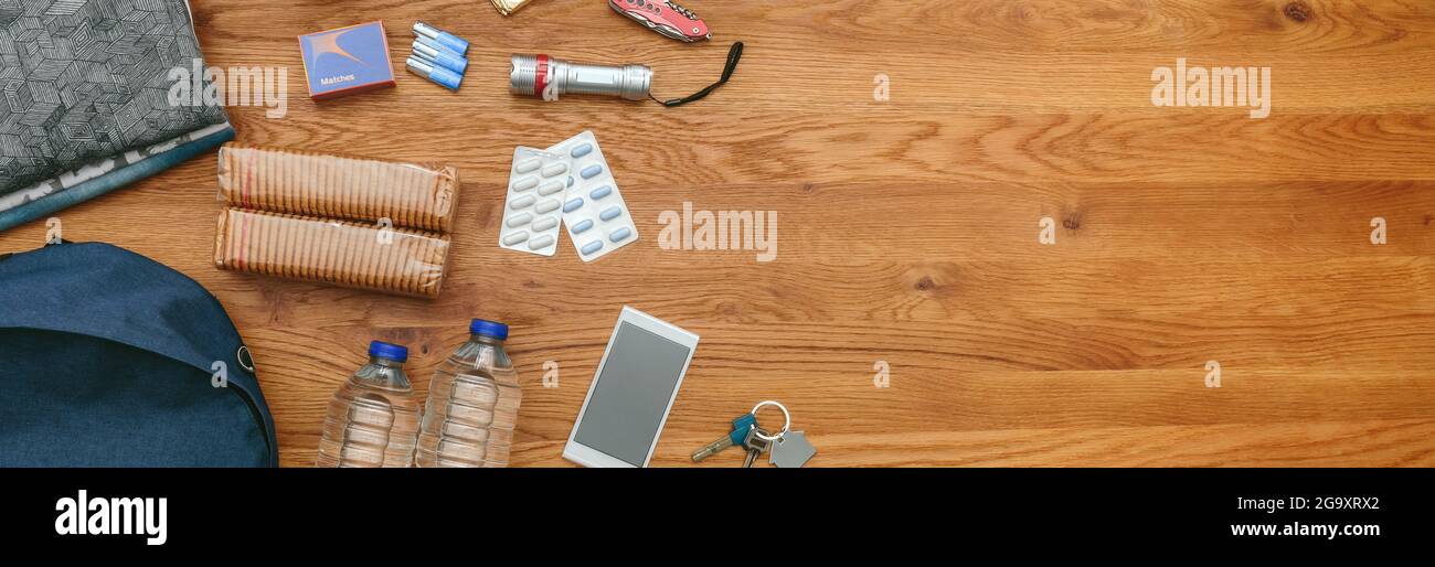 Top view of emergency backpack preparations Stock Photo
