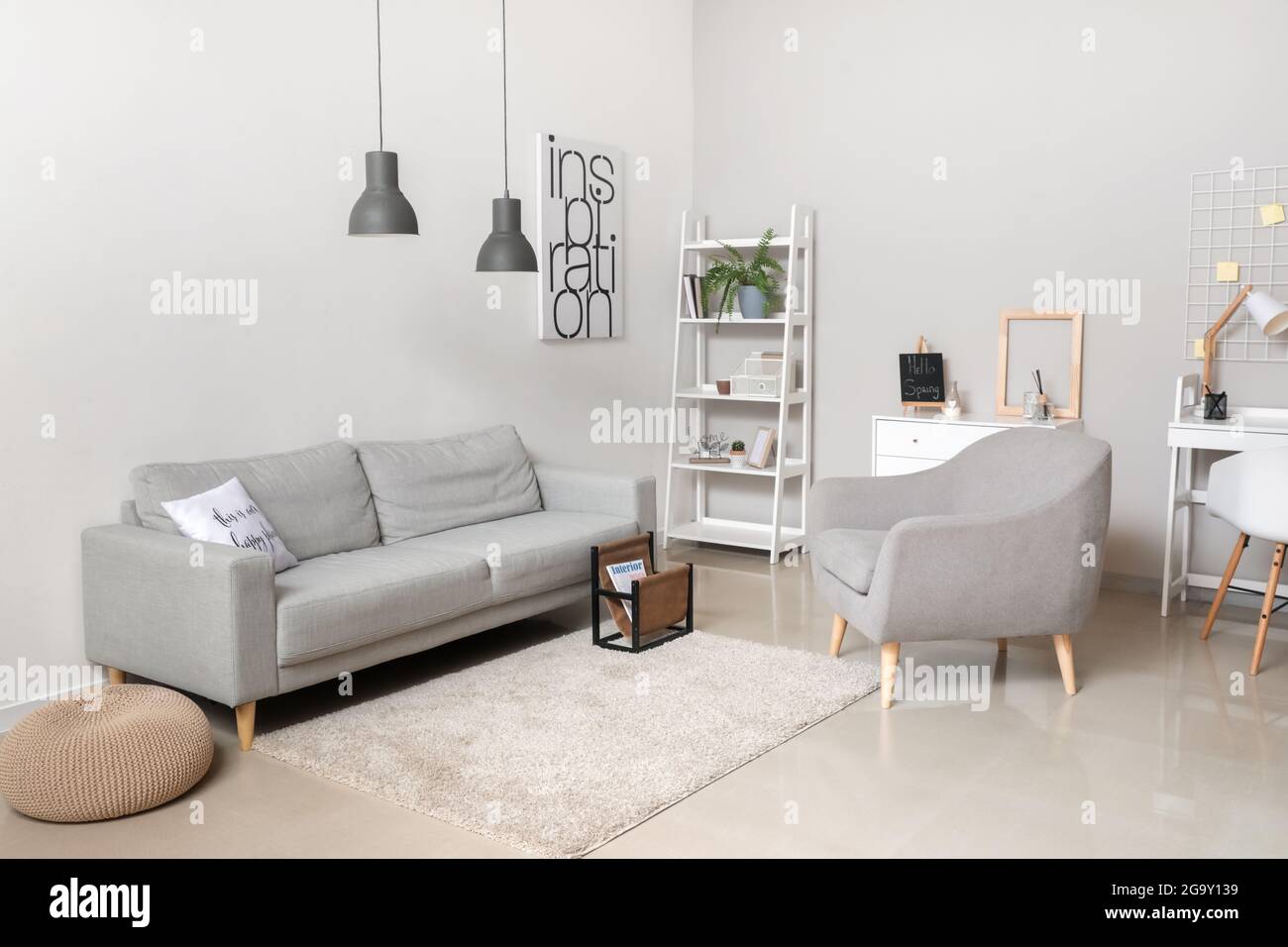 Interior of modern room with cozy sofa Stock Photo - Alamy