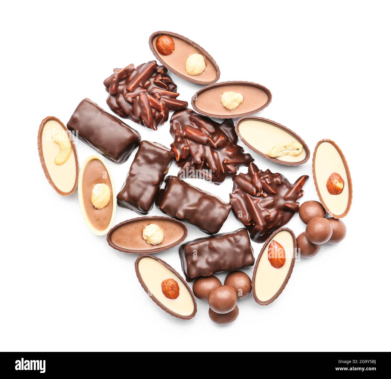 Different chocolate candies on white background Stock Photo - Alamy