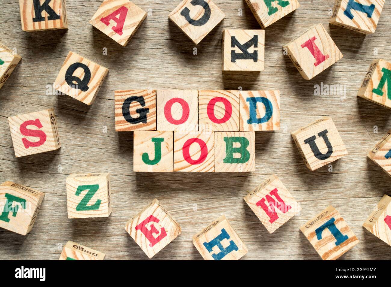 Letter block in word good job with another on wood background Stock ...