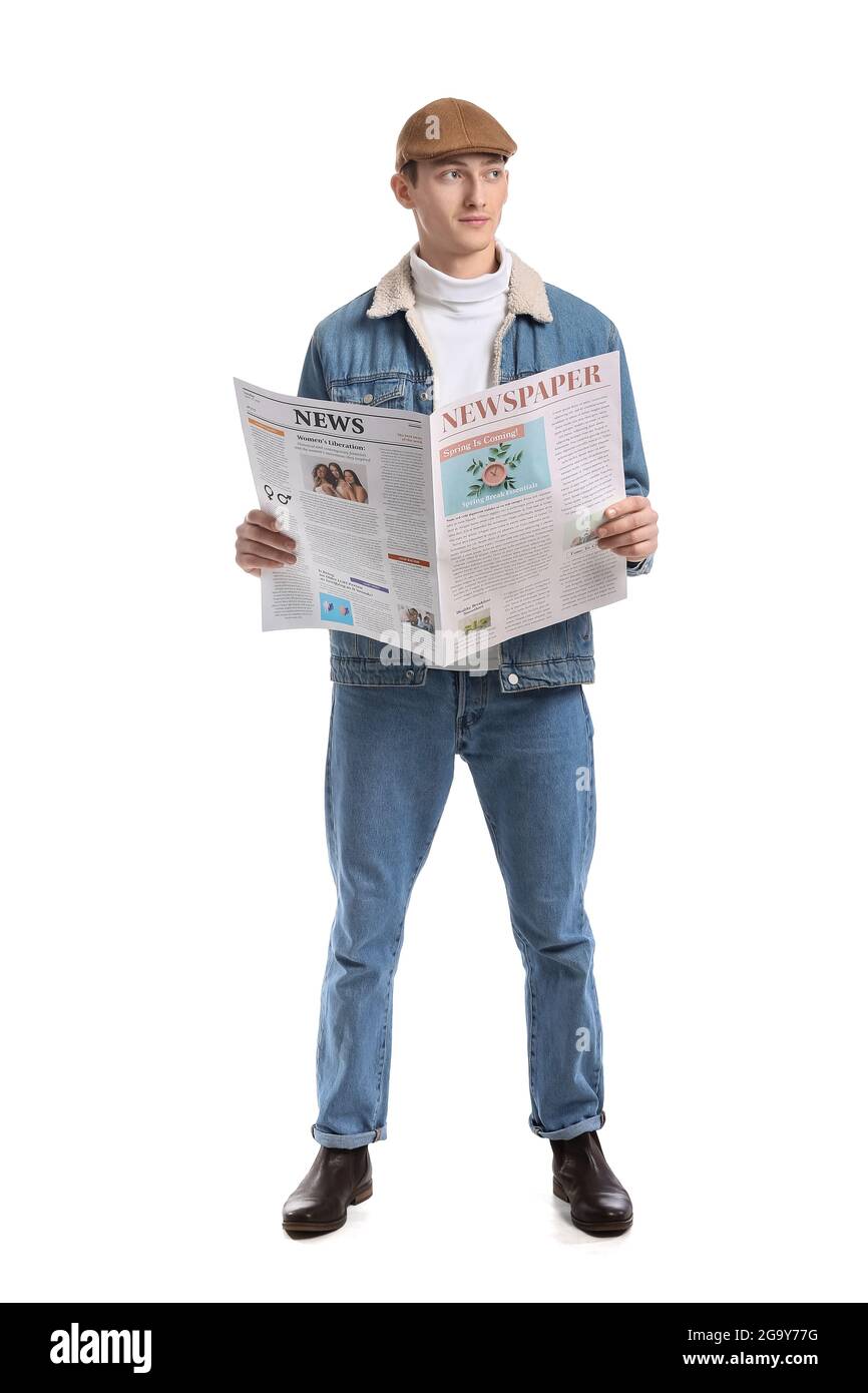 Young man reading newspaper on white background Stock Photo