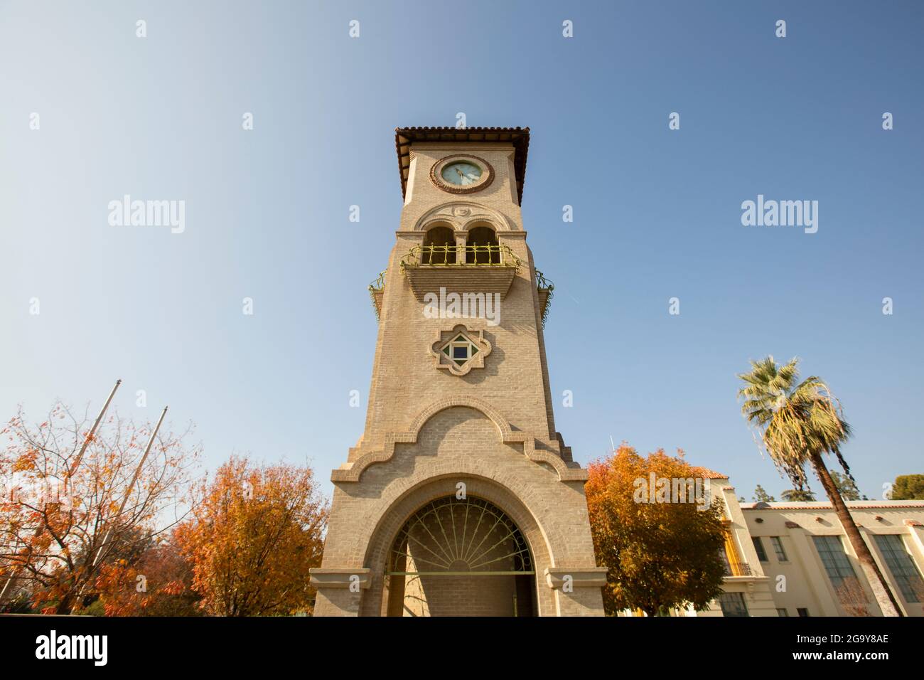 Daytime view of a historic public clock tower in downtown Bakersfield