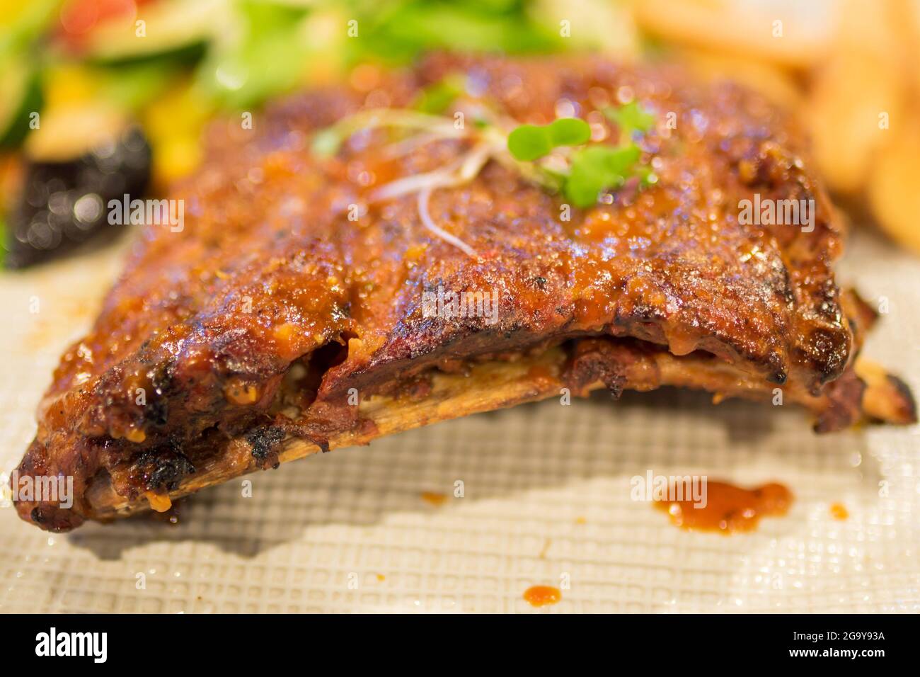 Close-Up of grilled pork ribs with honey Stock Photo