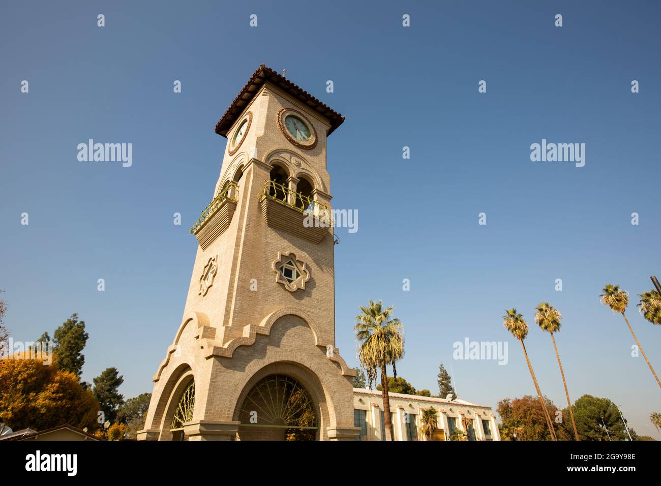 Daytime view of a historic public clock tower in downtown Bakersfield