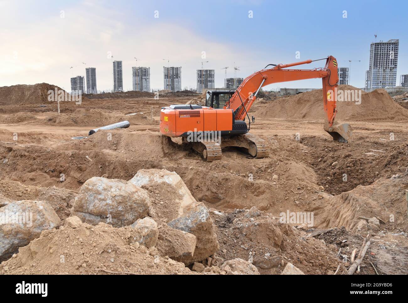 Excavator on earthworks at construction site. Backhoe on earthmoving ...