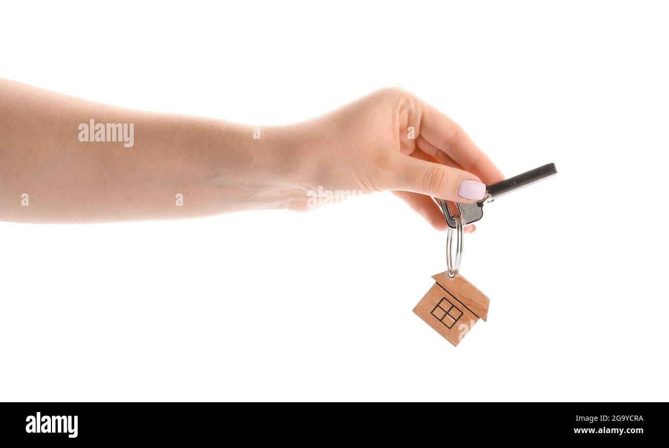 Hand with key on white background Stock Photo - Alamy