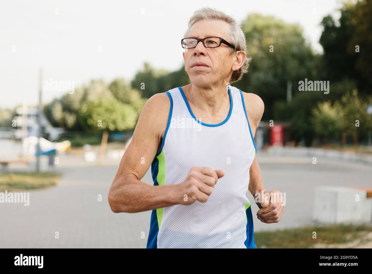 Old man running hi-res stock photography and images - Alamy