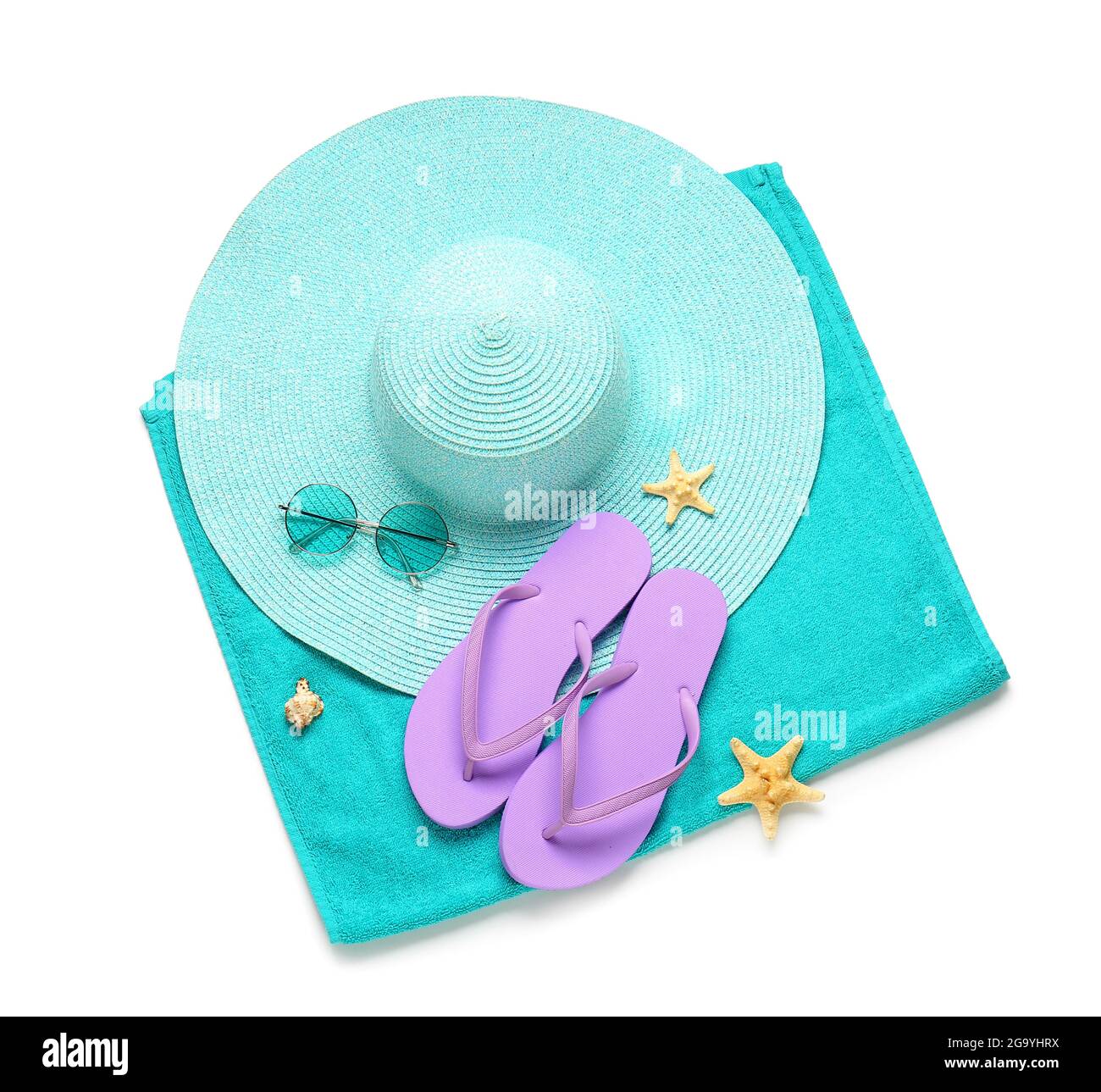 Towel, flip-flops, hat and sunglasses on white background Stock Photo ...