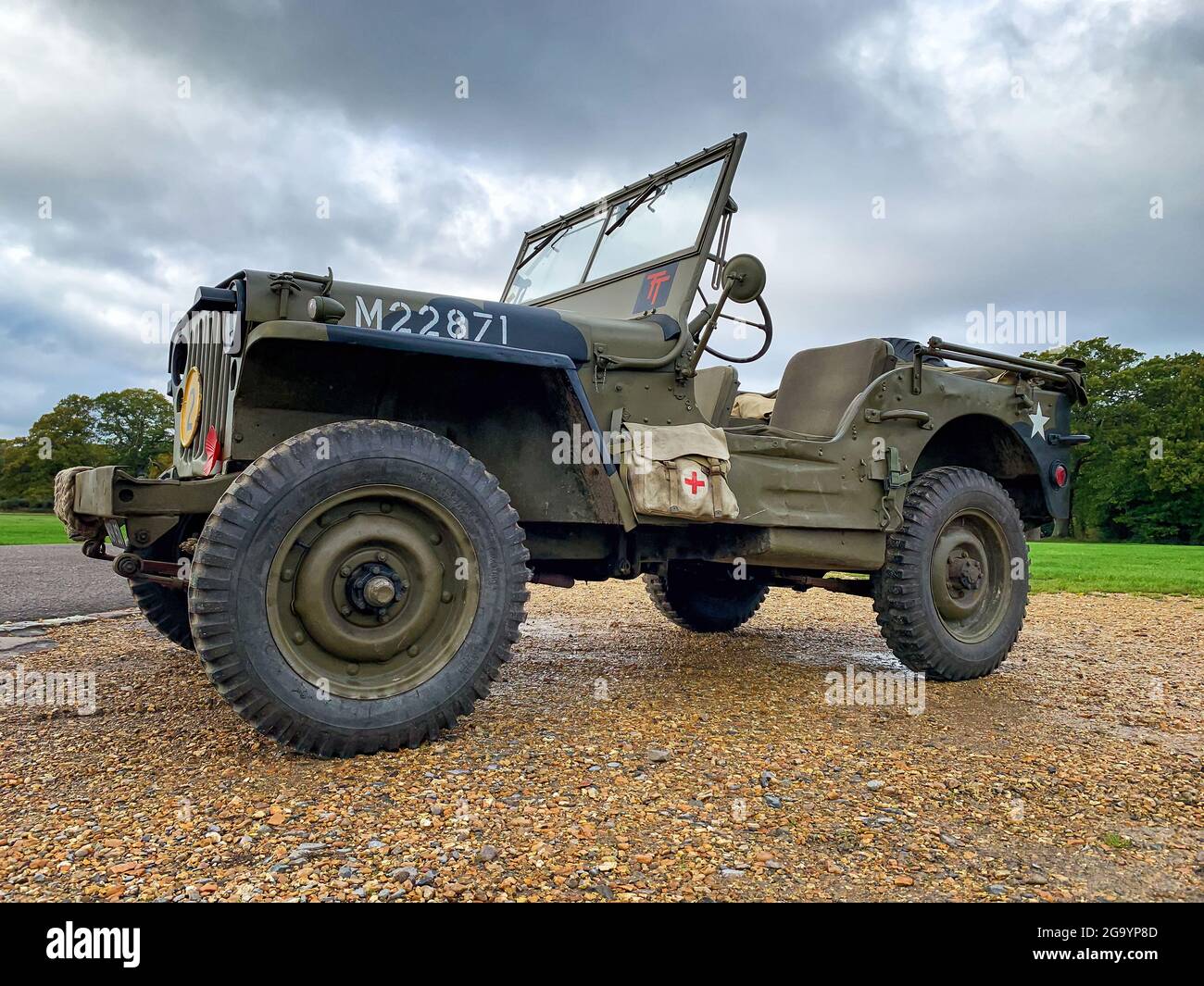 Southampton, UK - 3rd November 2019: Low level view of a British military World War 2 Jeep with Red Cross medical bag and Army camouflage finish. Sout Stock Photo