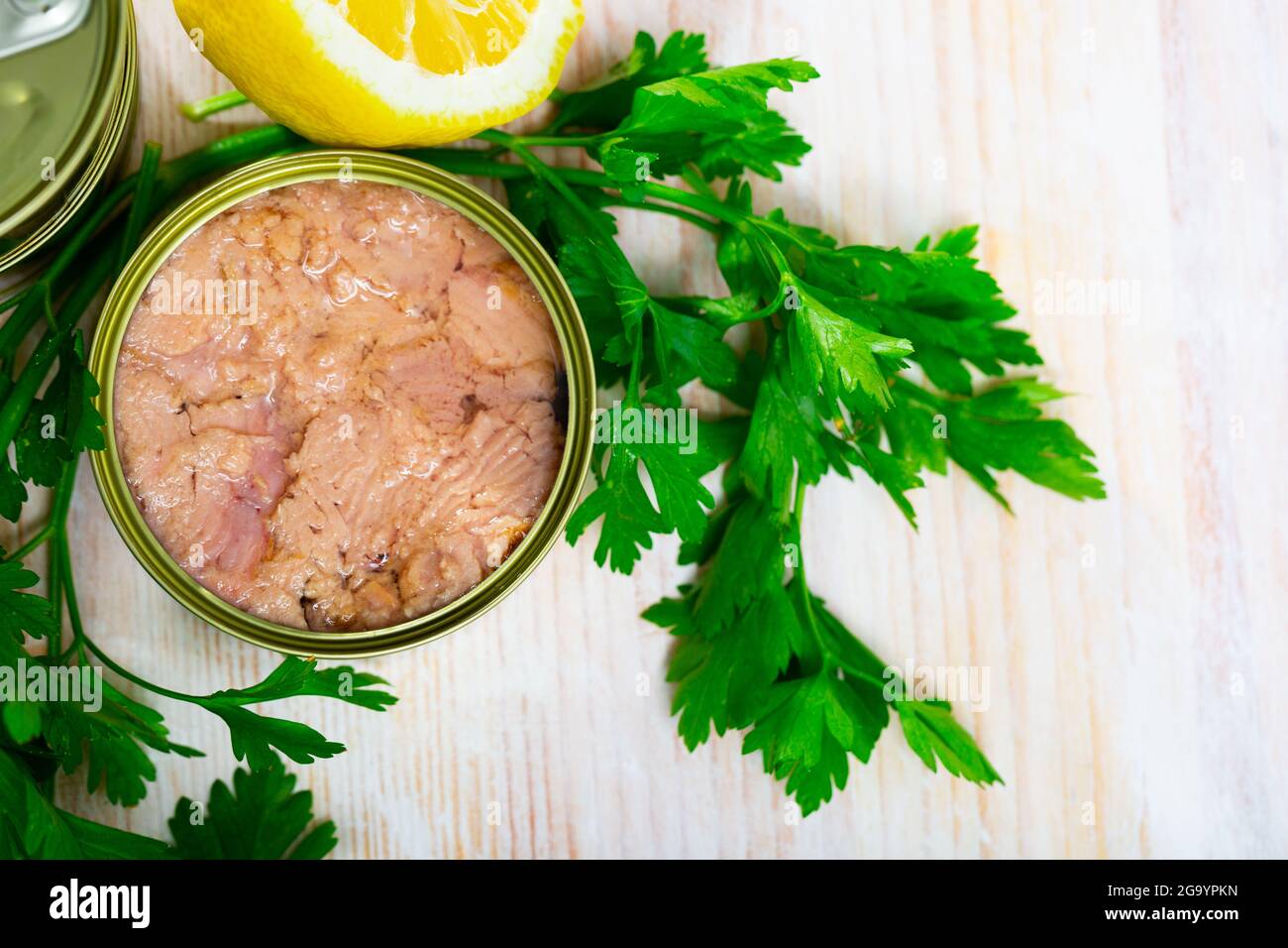 Open tin can of tuna in oil Stock Photo Alamy