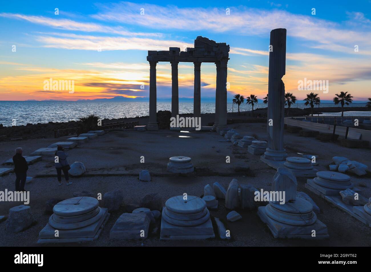 The Temple of Apollo Silhouette in the ancient Carian town of Side at sunset, in southern Turkey on the Mediterranean Sea coast, Greek and Roman. Stock Photo