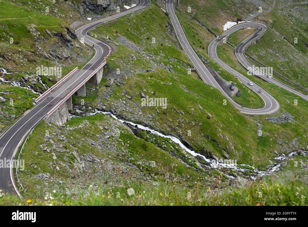 Landscape in Fagaras mountains in Romania, with Transfagarasan road. One of the most spectacular roads in the world Stock Photo