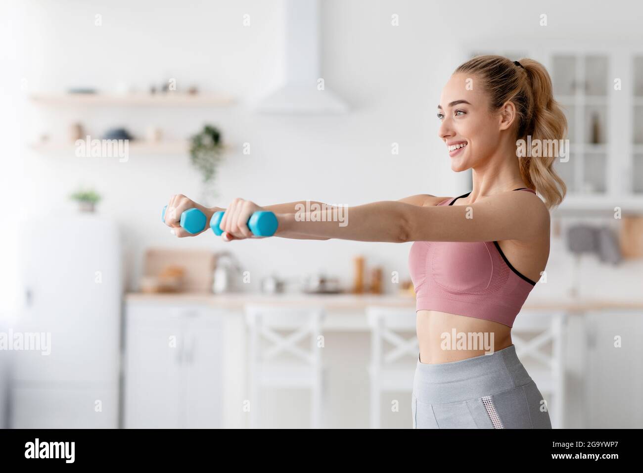 Active sports, physical training at home gym, covid-19 quarantine Stock Photo