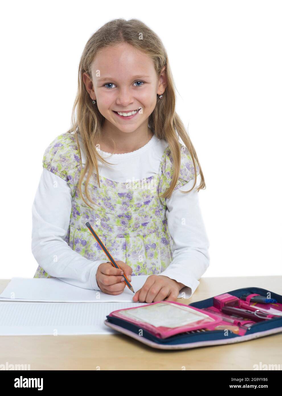smart girl doing homework, school is fun , Germany Stock Photo