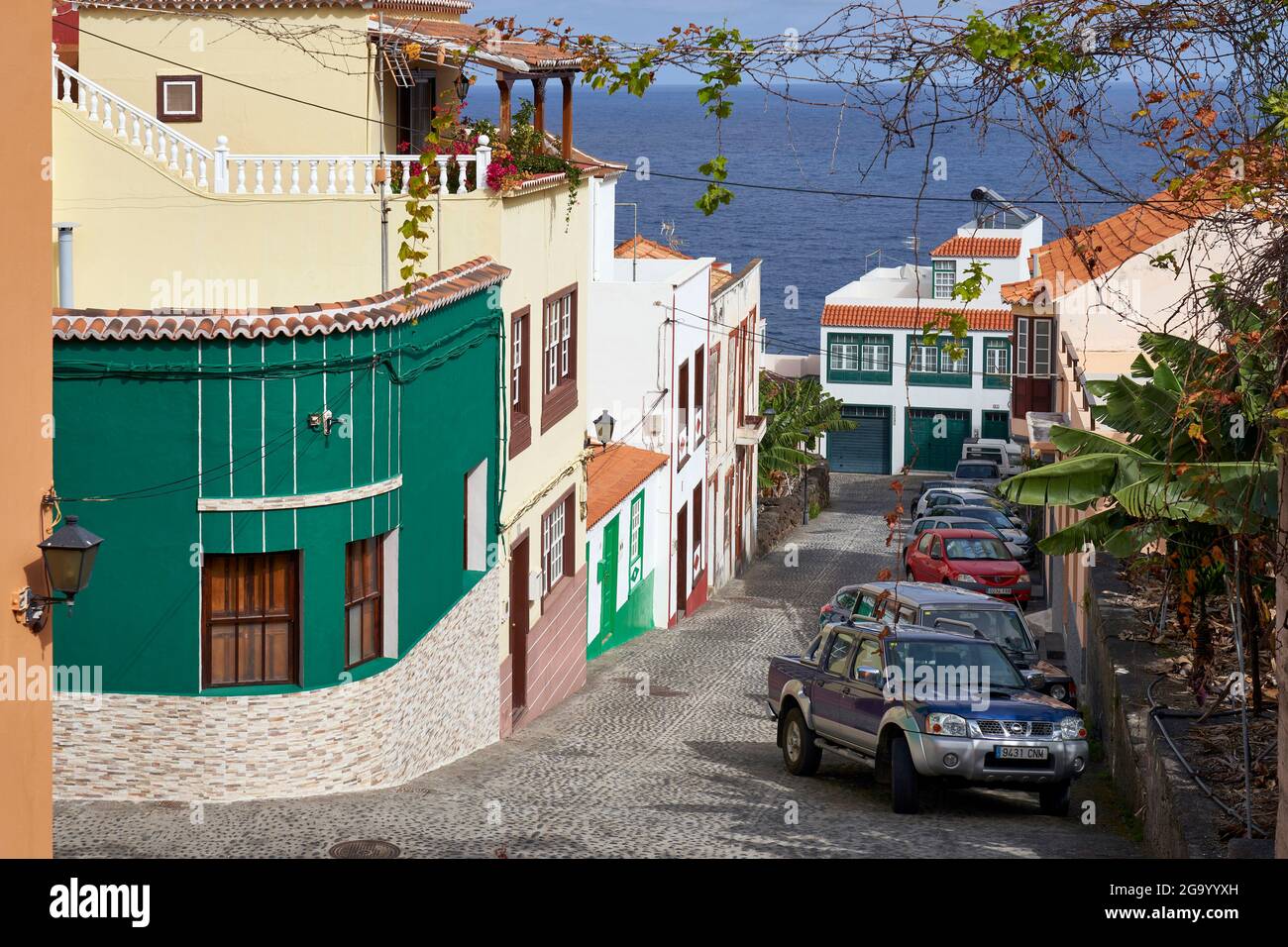 view through the Calle Iglesia of San Andres to the Atlantic Ocean. The village is considered the most beautiful settlement on the island of La Stock Photo