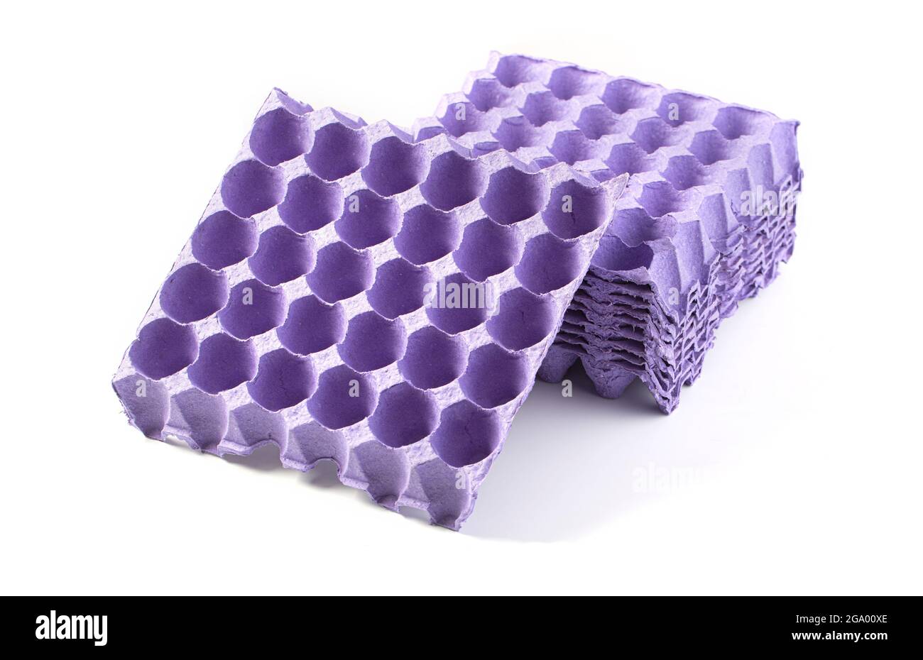 The cardboard egg tray on the white table Stock Photo Alamy