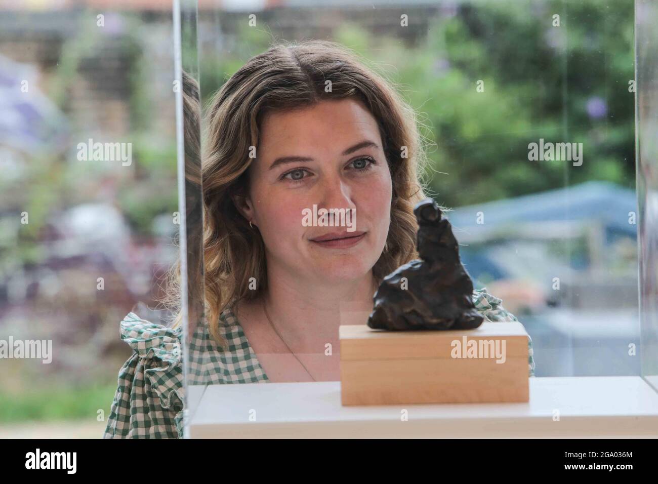 London UK 28 July 2021 Tracey Emin The Wedding £6,500 2019 Bronze sculpture Edition of 50 5cm x 10cm x 12cmTracy Emin  Turner Prize-nominated unmade bed might have won her fame and notoriety as part of the YBA movement, but her poignant, autobiographical paintings, sculptures, photographs and installations have enduring appeal, winning her places in collections including the Tate Gallery in London and New Yorkʼs MoMA. Inspired by Edvard Munch and Egon Schiele, Emin studied at the Royal Academy of Arts and has maintained a continuity in themes throughout her career, exploring gender and relatio Stock Photo