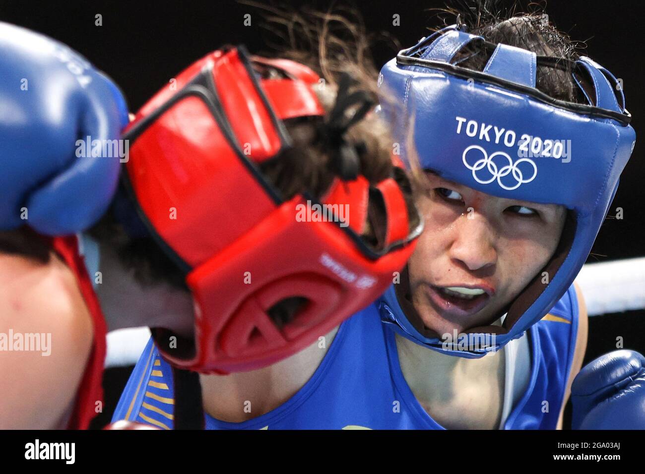 Li Quan Boxing Tokyo, Japan. 28th July, 2021. Li Qian (R) of China competes during the ...