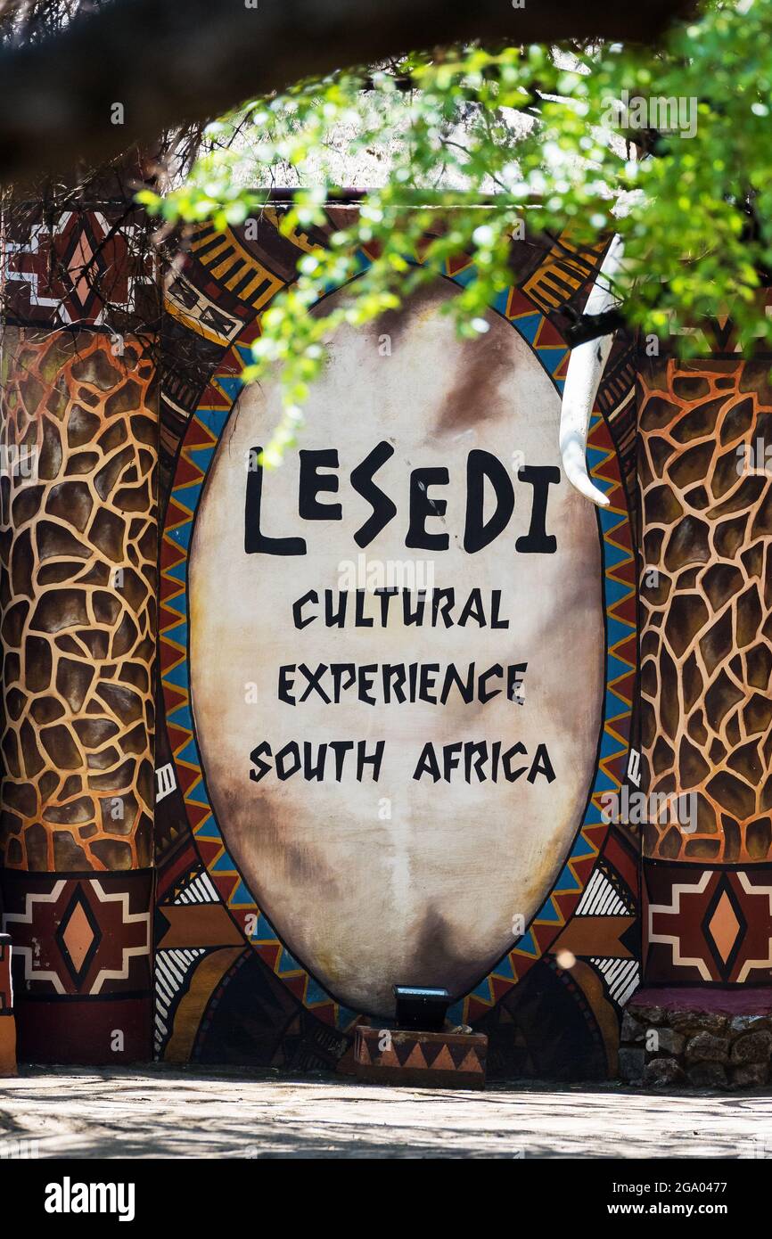 Lesedi Cultural Village, South Africa - 4th November 2021: A welcoming sign for the Lesedi cultural experience, in traditional African geometric desig Stock Photo