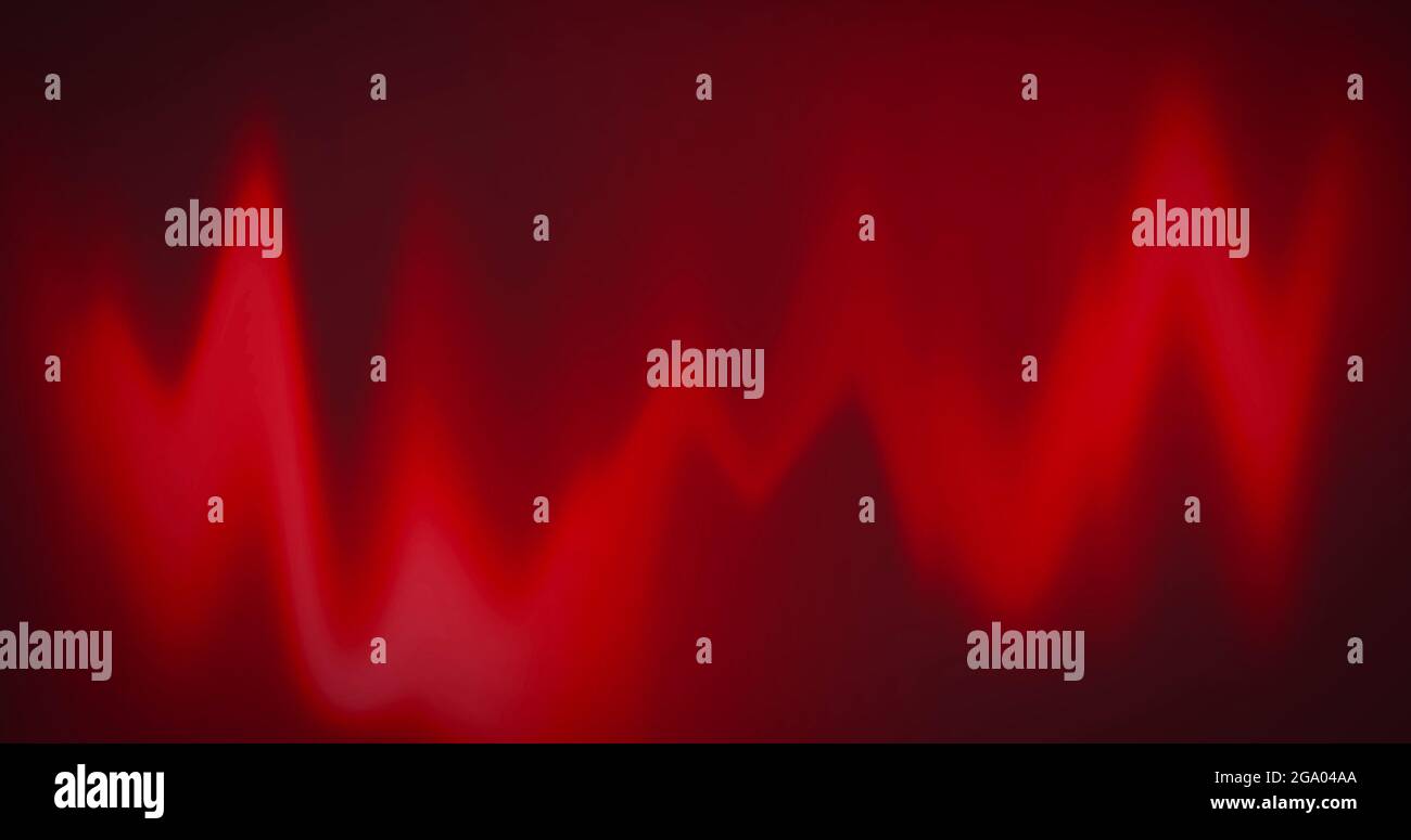 Digital animation of red heart rate monitor waves on black background ...