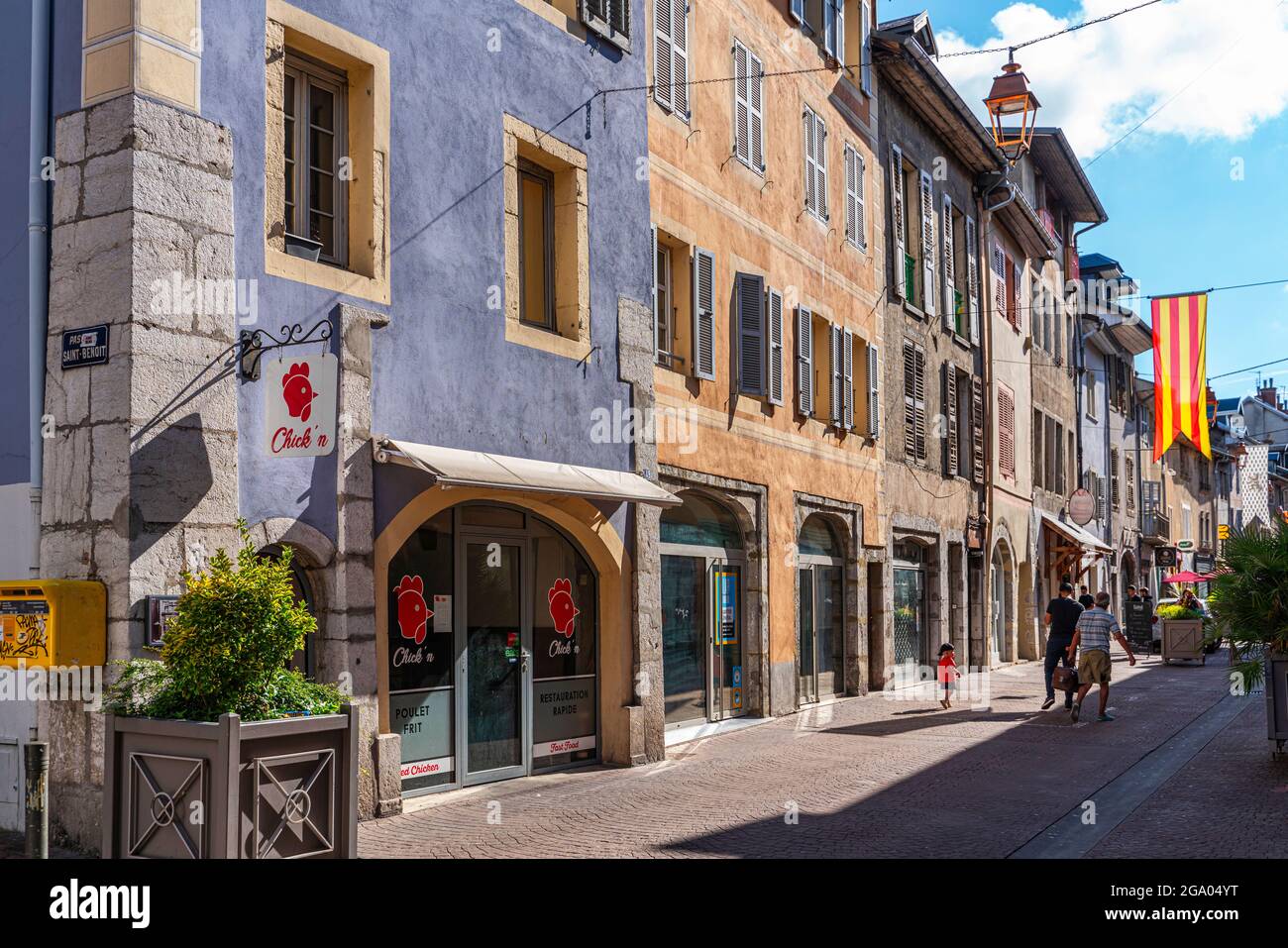 Old medieval houses renovated with shops and businesses in the Montmélian faubourg. Chambery, Auvergne-Rhône-Alpes region, Savoy, France Stock Photo