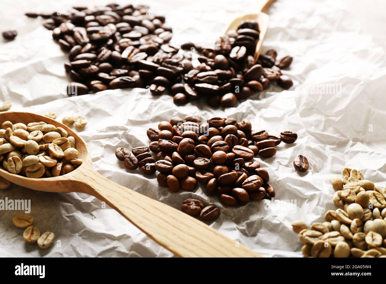 Coffee beans on crumpled parchment, closeup Stock Photo Alamy