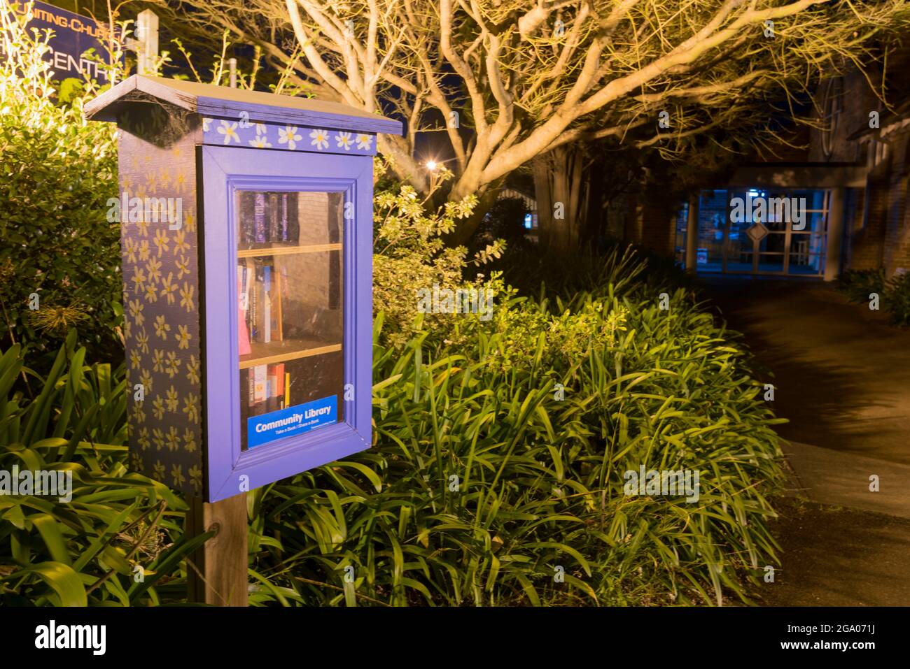 A Street Library near a church in Turramurra Sydney. Built and run locally these mini libraries promote reading, sharing and a feeling of community Stock Photo