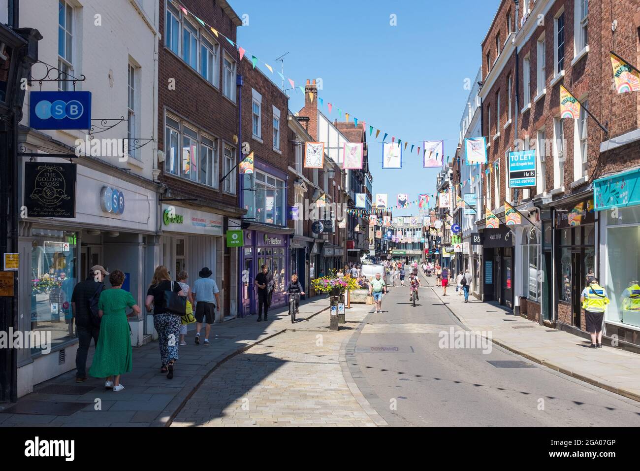Shops and shoppers in High Street, Shrewsbury, Shropshire Stock Photo ...