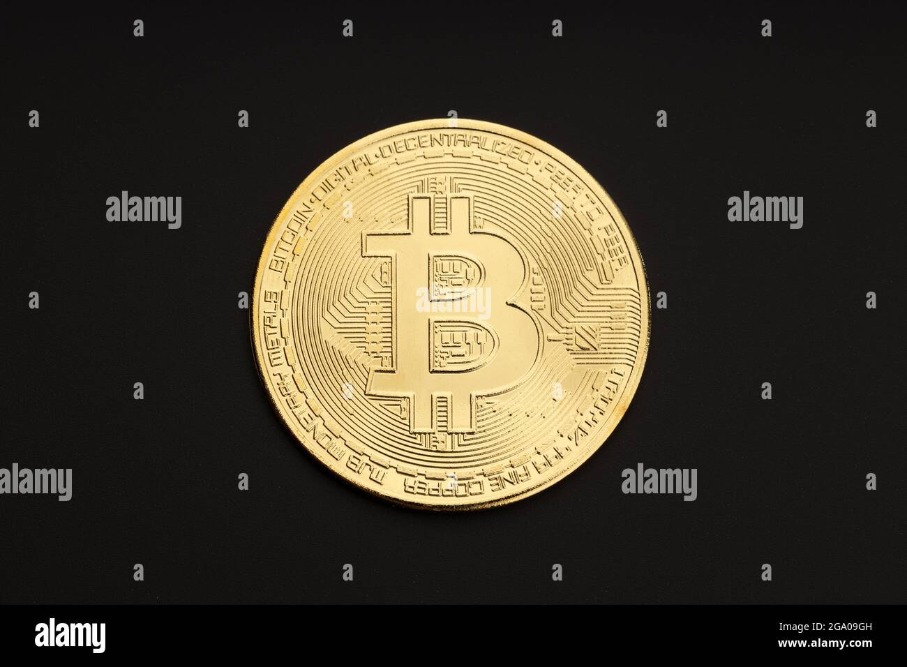 Bitcoin coin isolated on black background Stock Photo - Alamy