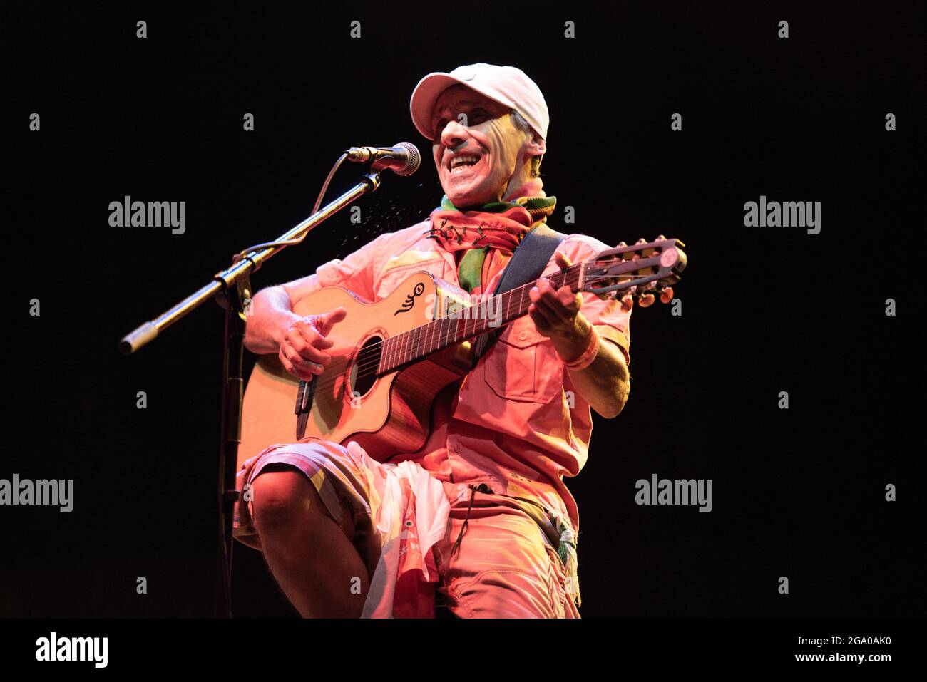 COLLEGNO, FLOWERS FESTIVAL, JULY 27TH 2021: The French singer of Spanish descent Manu Chao performing live on stage for his “El Chapulín Solo – Manu Chao Acústico” Italian tour. Stock Photo