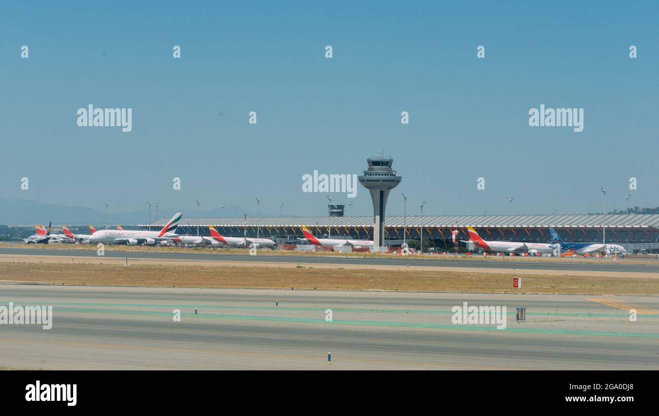 MADRID, SPAIN - Jul 16, 2021: An Iberia Airlines on the runway of tarmac at Madrid-Barajas Adolfo Suarez Airport in Spain Stock Photo
