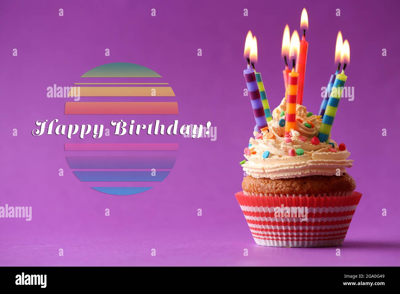 Birthday cupcake with candles on color background Stock Photo - Alamy