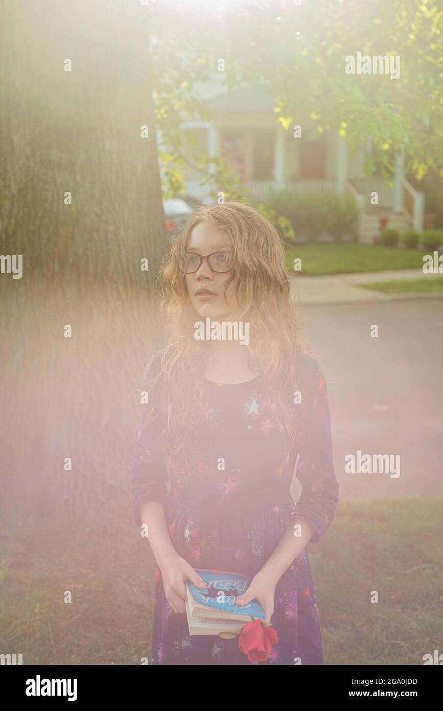 Summer in the neighborhood with a good book Stock Photo Alamy
