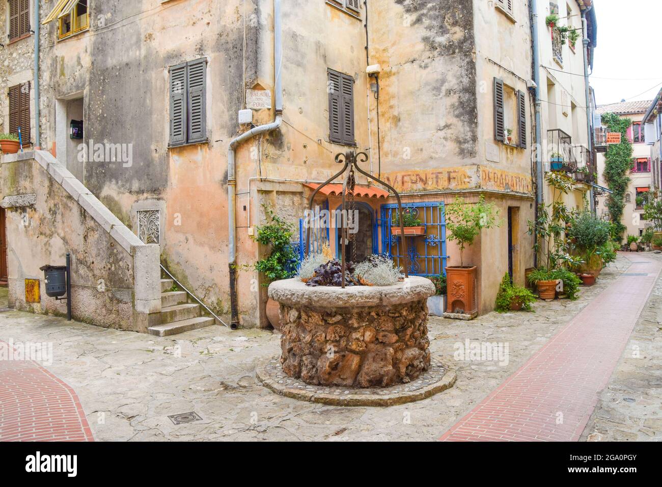 Old well in La Turbie medieval village, South of France Stock Photo
