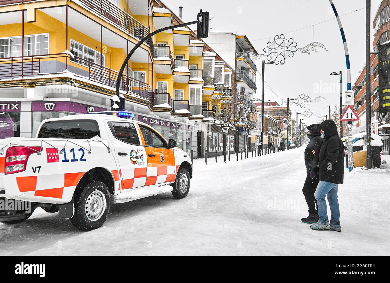 Civil protection patrol drives along the downtown streets during Storm Filomena. Getafe. Community of Madrid. Spain. Stock Photo