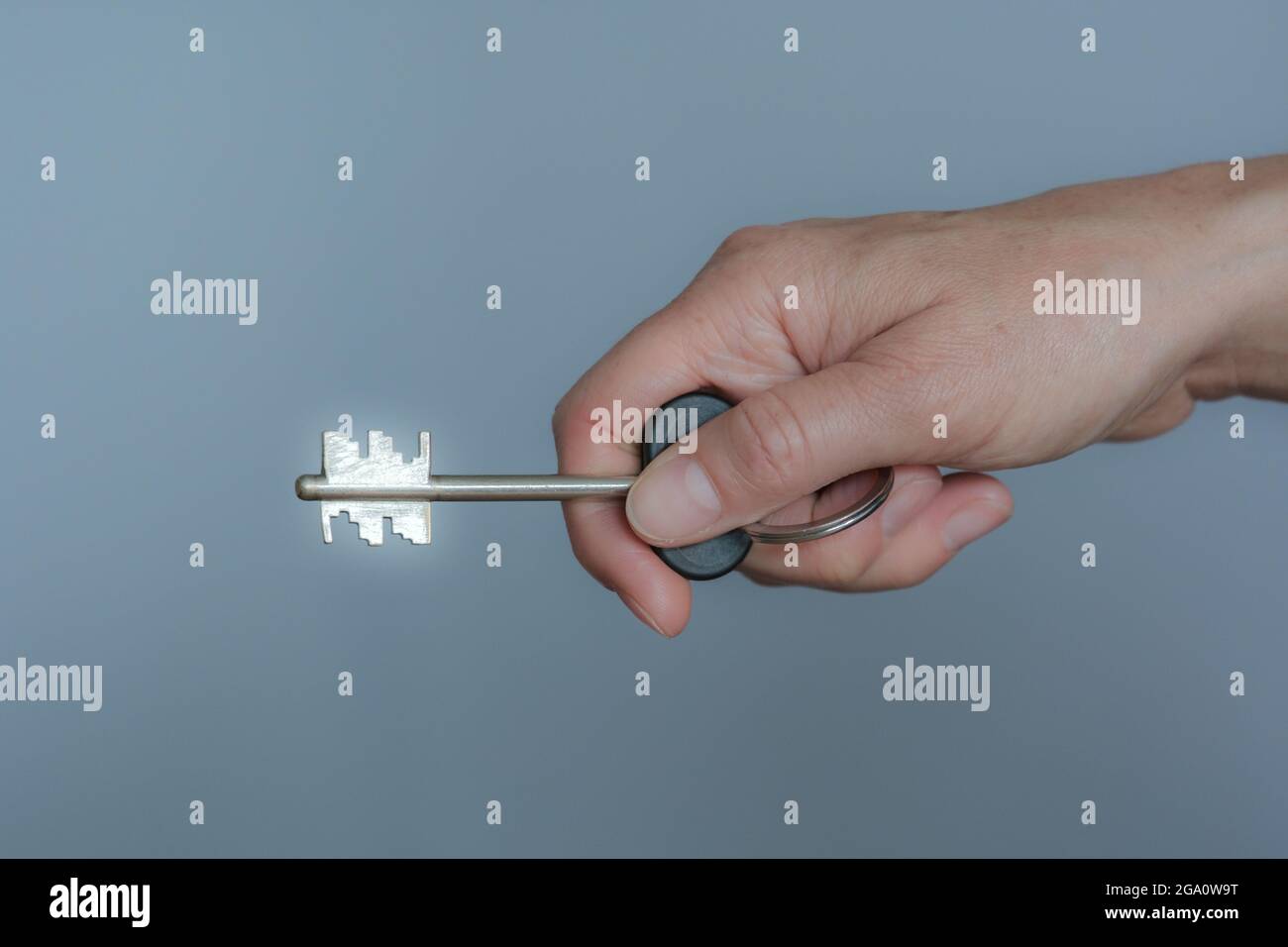 Hand key open door hi-res stock photography and images - Alamy