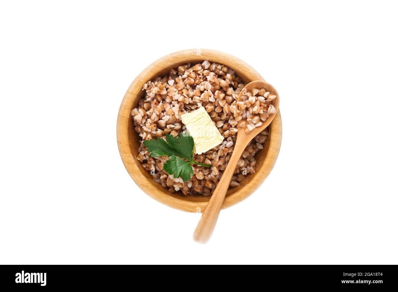Buckwheat porridge in bamboo bowl with parsley leaf and butter isolated