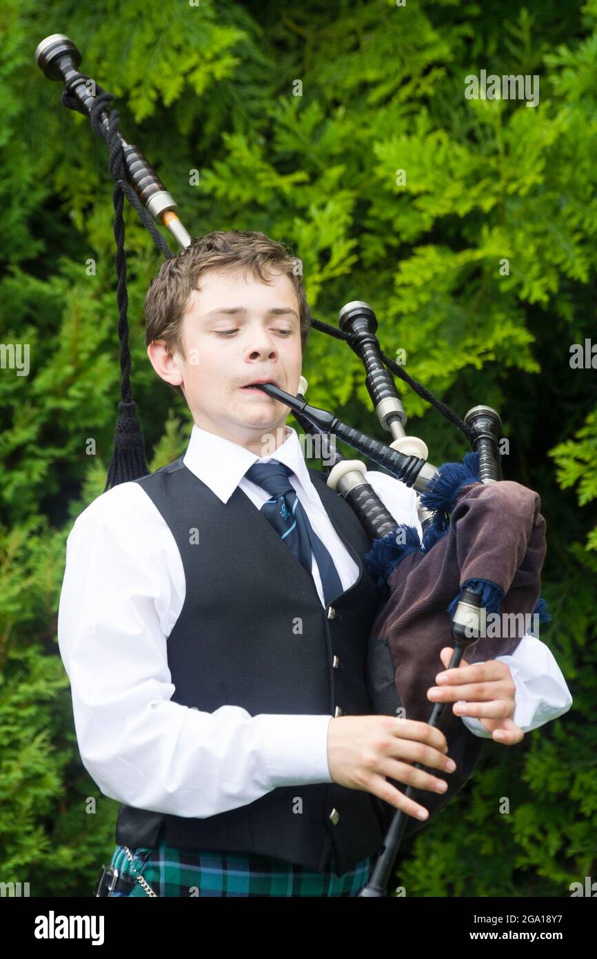Boy playing the bagpipes, Scotland Stock Photo Alamy