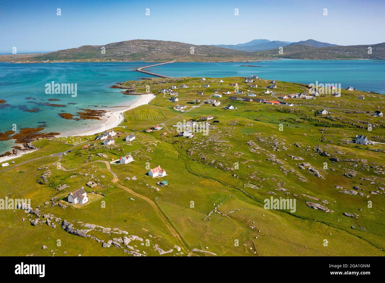 Aerial view from drone of houses in village of Balla on island of Eriskay in the Outer Hebrides, Scotland, UK Stock Photo