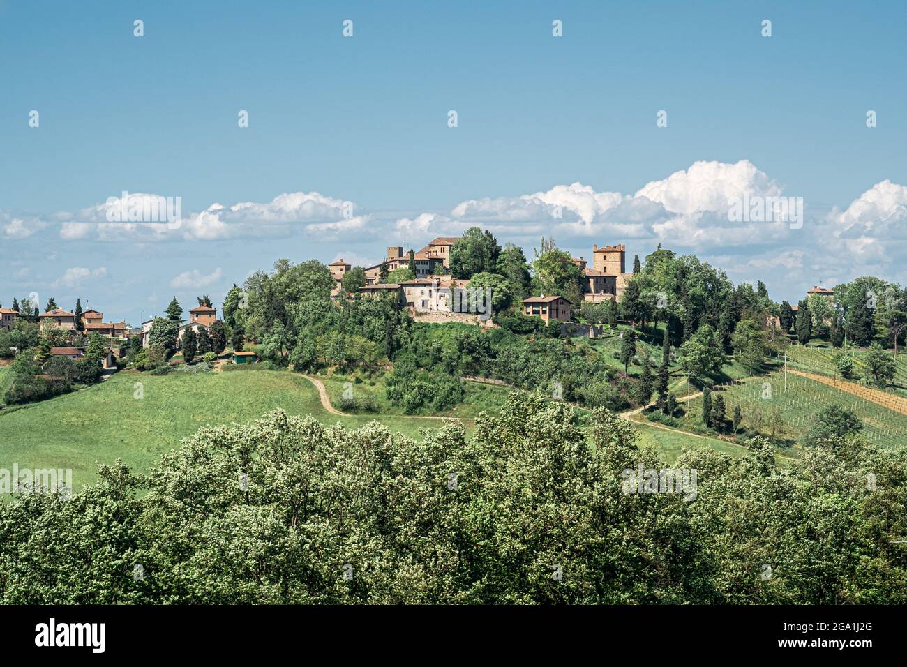 The village of Castello di Serravalle - Castle of Serravalle in springtime viewed from south. Bologna province, Emilia and Romagna, Italy Stock Photo