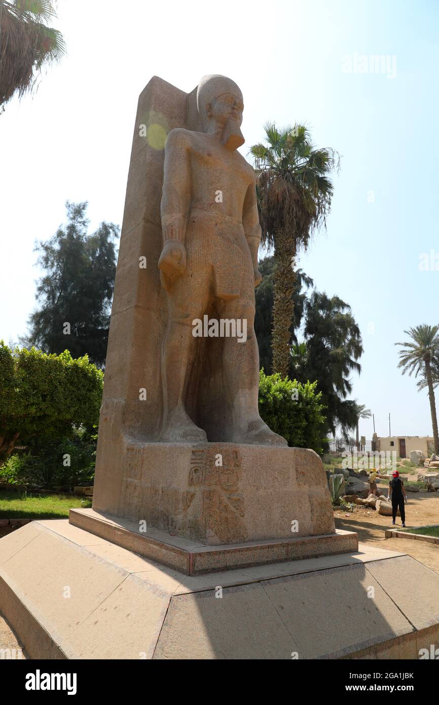 (210728) -- CAIRO, July 28, 2021 (Xinhua) -- Photo shows the colossal statue of ancient Egyptian Pharaoh Ramesses II at the ruins of ancient Egyptian city of Memphis, around 23 kilometers southwest to Cairo, capital of Egypt, July 28, 2021. Memphis, founded around 3,100 BC, was the capital of ancient Egypt during the Old Kingdom spanning from 2700-2200 BC and remained an important city throughout ancient Egyptian history. Today, the ruins of the former capital offer fragmented evidence of its past. Together with its necropolis (the pyramid fields from Giza to Dahshur), Memphis was inscribed as Stock Photo