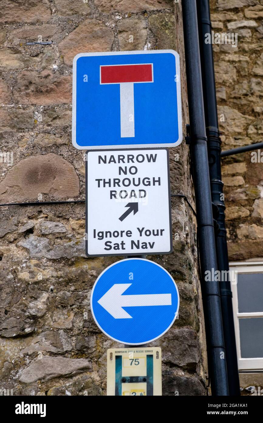 Sign saying Ignore Your Sat Nav No Through Road Winster Derbyshire Stock Photo