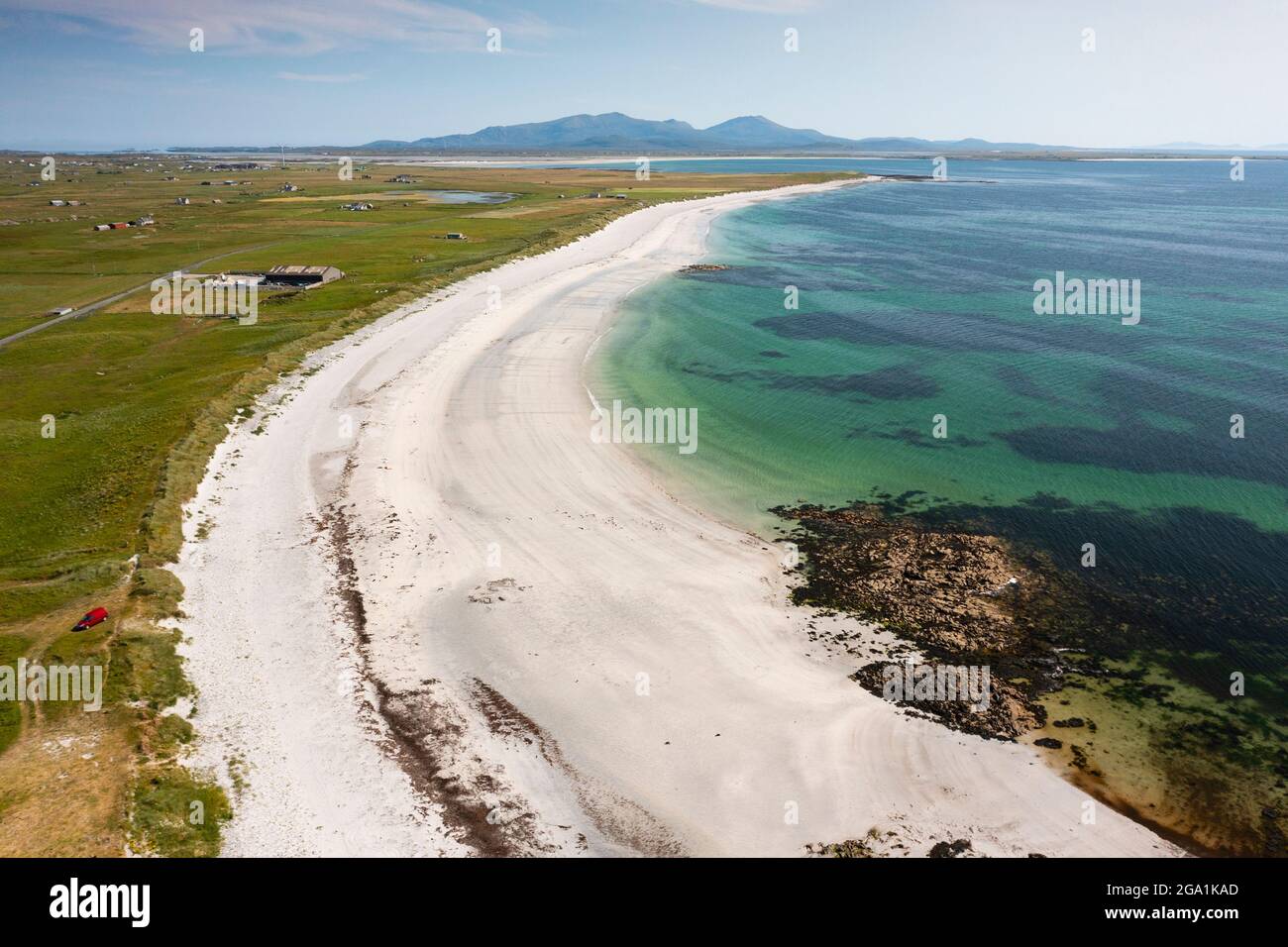 Aerial view from drone of white sands on beach on west coast of island of Benbecula looking south to South Uist, Outer Hebrides, Scotland, UK Stock Photo